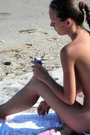 With bald pussy various nudists chicks flirts with nudist men on fkk beach