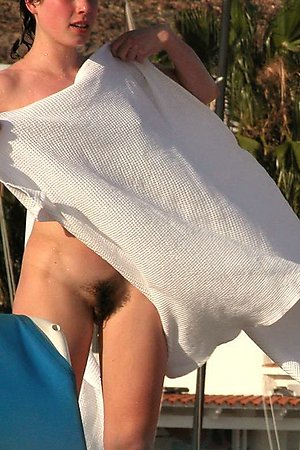 cute teens admires itself on the private beach