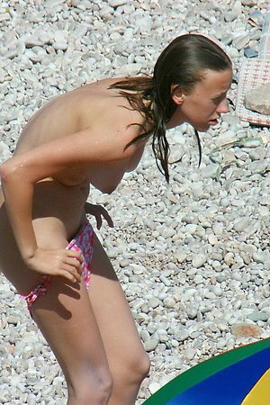 Voyeur photos of nude girls on beach - series of shots