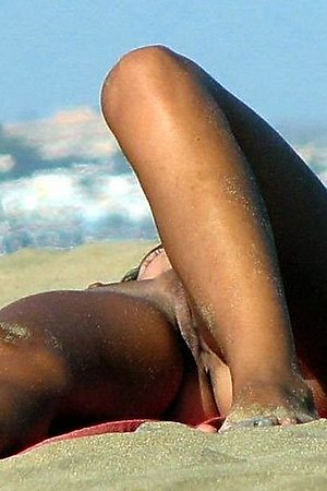 Nudist girls alone on beach