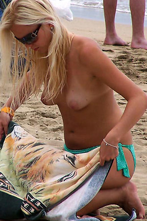 Sunbathing babes wear no bras