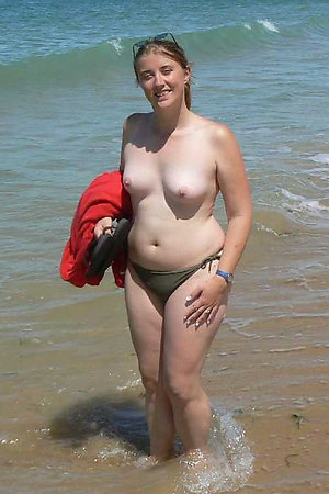 Fat nude mature ladies having fun in a water