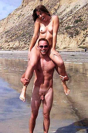 Sexy nudist girls spreads legs on the beach