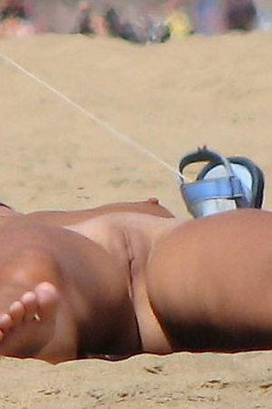Collection of voyeur pictures from nude beach