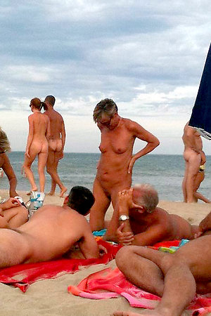 Naked girl and nude pussy on the beach