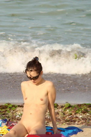Nudist girls alone on beach