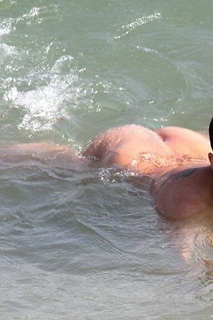 Nudists has fun on beach