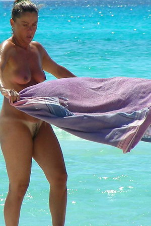 Nudist girls on beach filmed