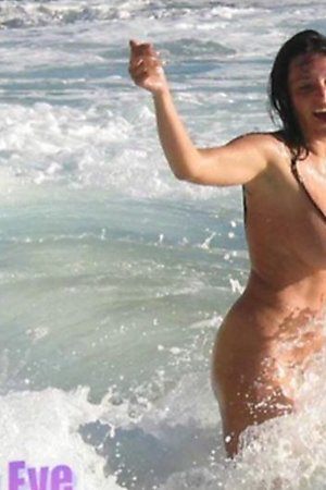 Wet women at nude beach