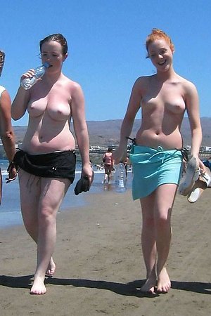 A bikini bitch going topless on the Biarritz