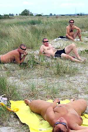 Young teen nudists showing their bodies on the beach