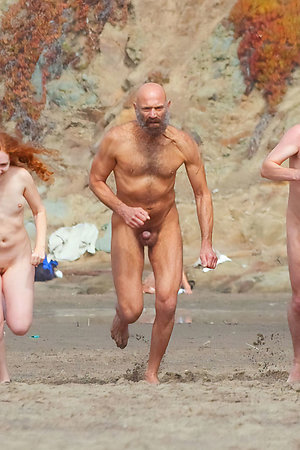 Old and young nudists playing sport games